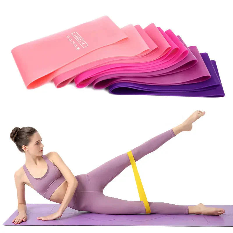 HealthyRealLife resistance bands set for workouts shown in pink and purple bands with woman using yellow band for leg raises