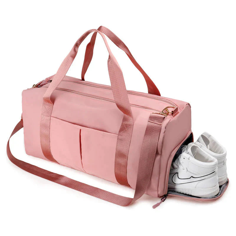 HealthyRealLife pink waterproof fitness duffel bag with side shoe compartment front pockets and shoulder strap