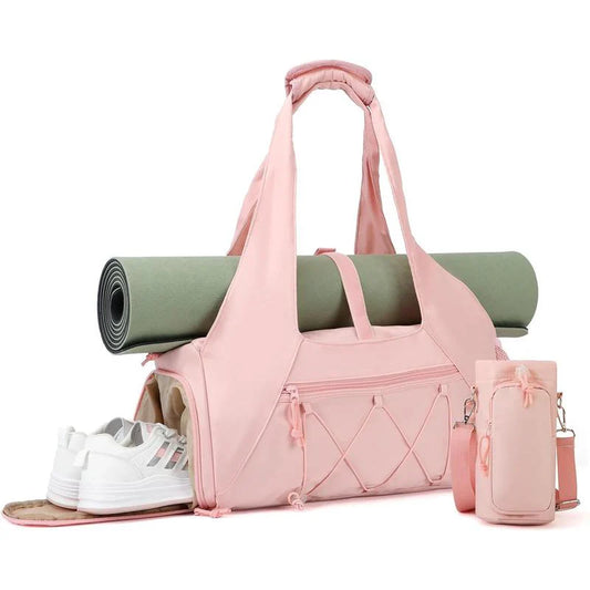 Pink yoga tote bag with pockets holding mat shoes water bottle detachable pouch and padded shoulder straps
