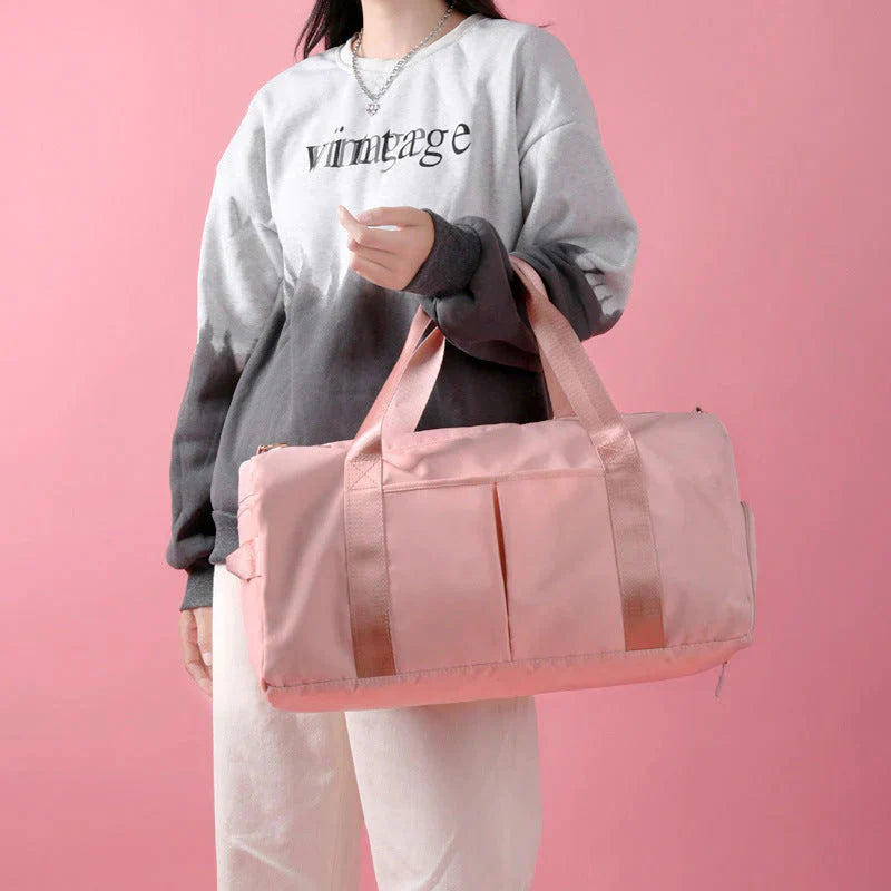 HealthyRealLife pink waterproof fitness duffel bag with dual handles and front pocket for gym travel