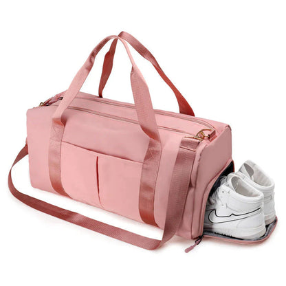HealthyRealLife pink waterproof fitness duffel bag with side shoe compartment front pockets and shoulder strap