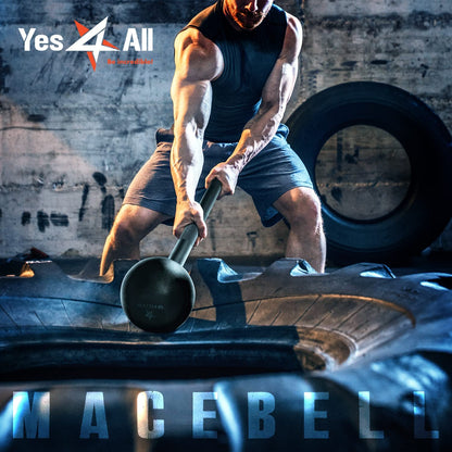 Athletic man swinging a steel mace bell for strength training over a large tire in a gym
